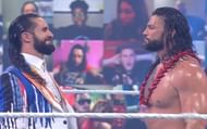 Seth Rollins and Roman Reigns having a tense confrontation on SmackDown